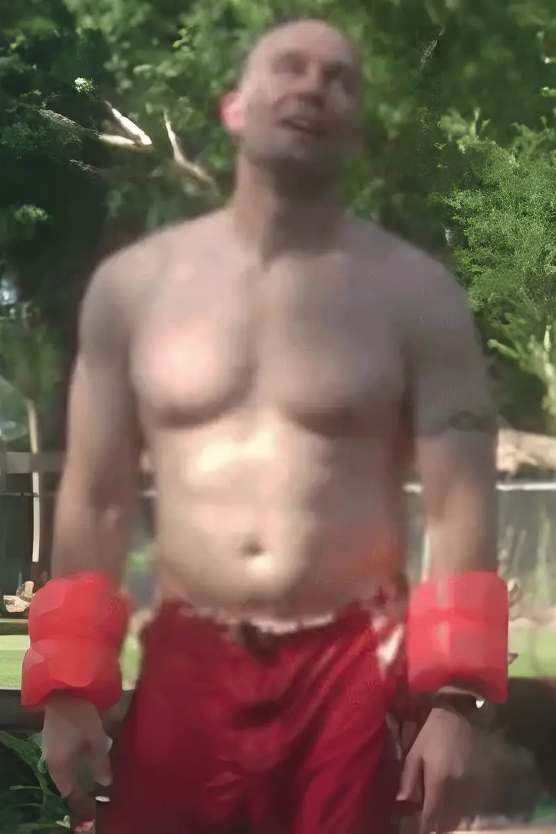 Coach Rob Yahn before he started training seriously, standing outdoors with a softer build.