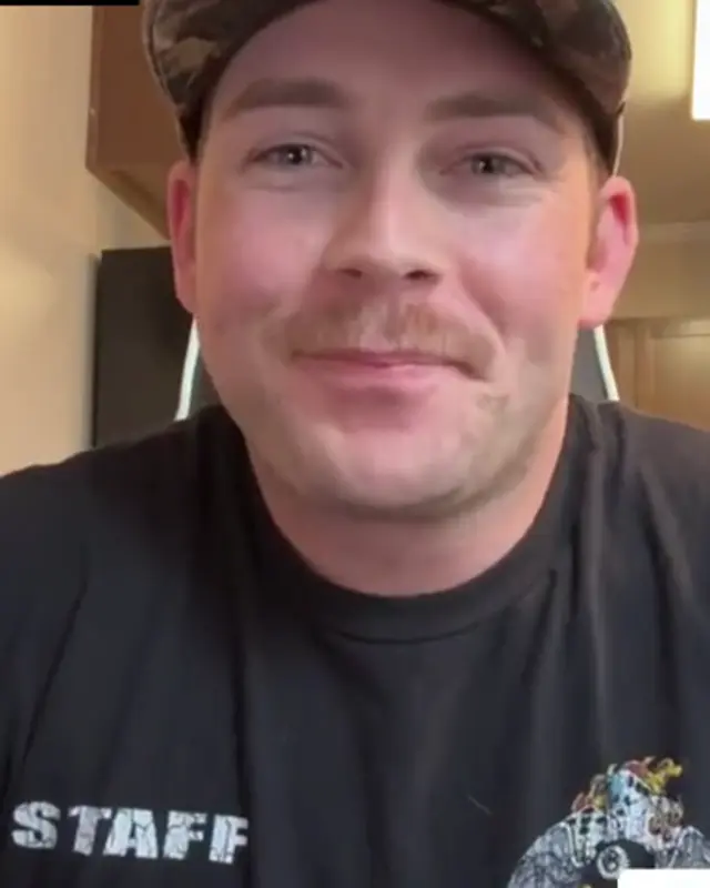 Shane laughing during his reflection interview.